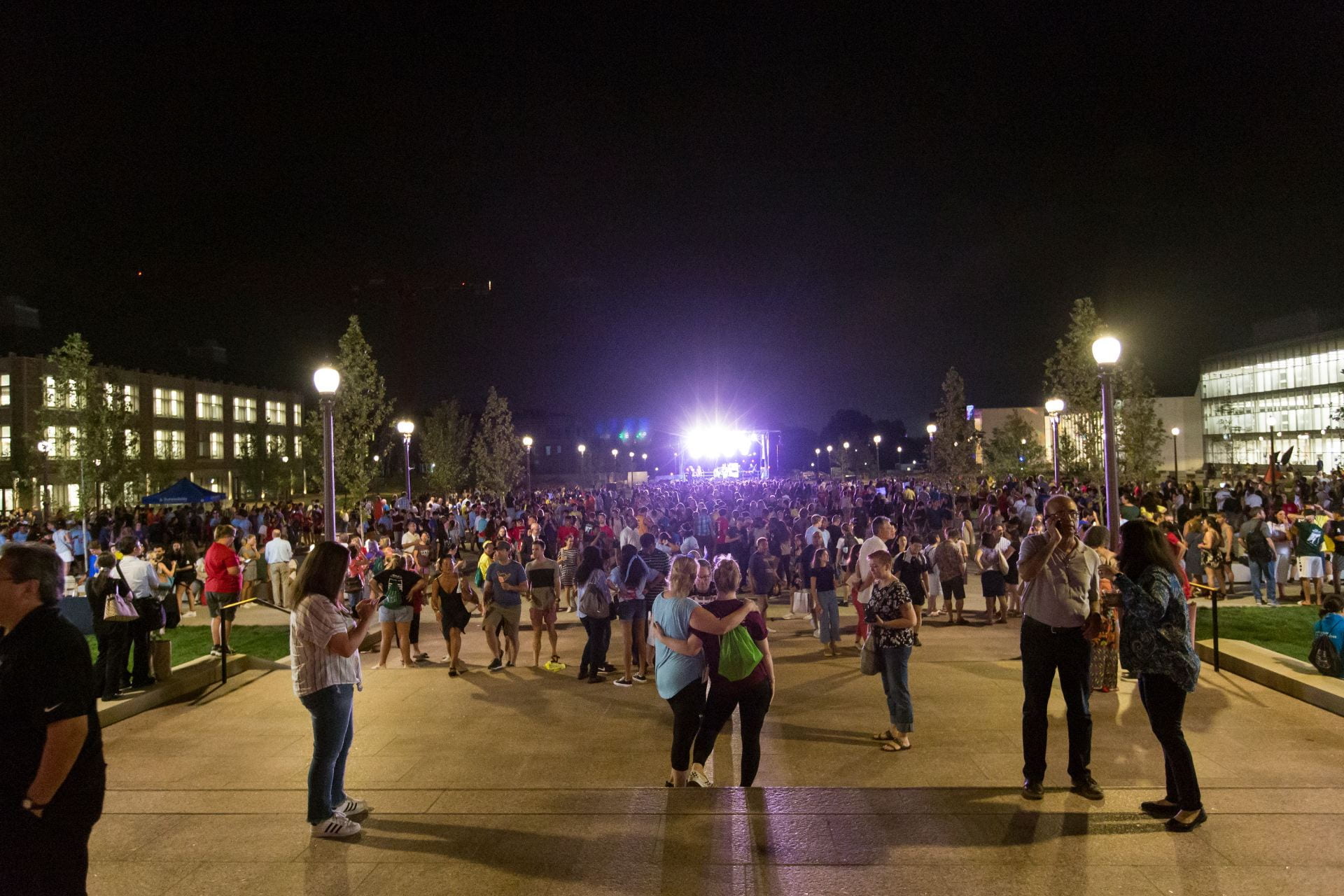 Guests fill the Tisch Park at a party after Convocation on the campus of Washington University in St. Louis.